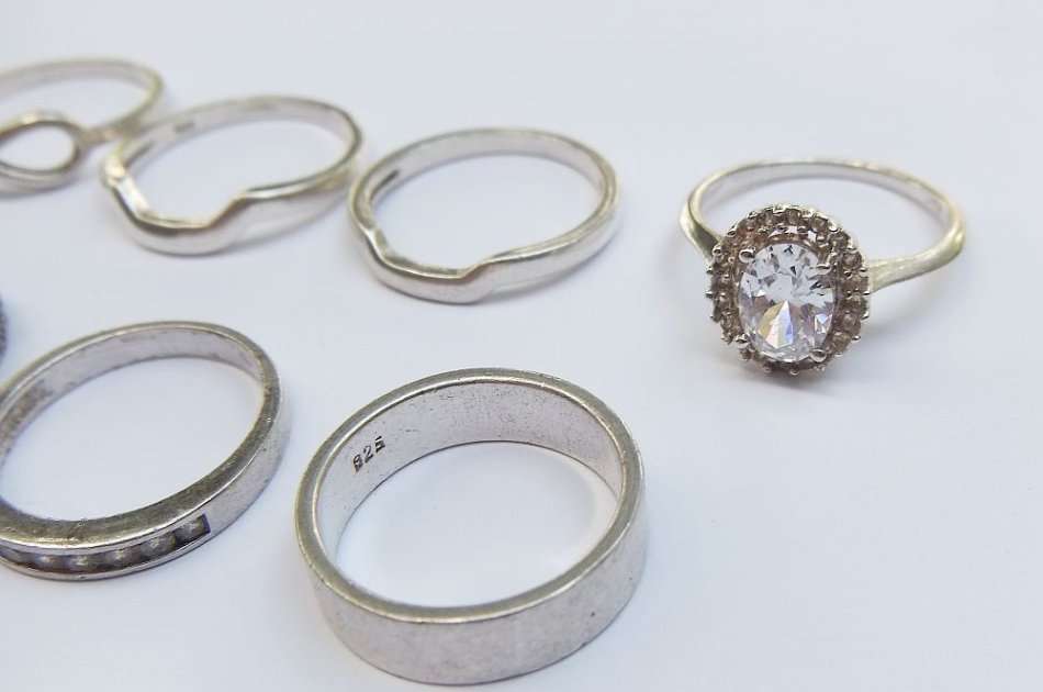 OH BOY !! WHAT A TREAT !! NINE SOLID STERLING SILVER RINGS FOR YOUR COLLECTION !! BID FOR THE LOT !!