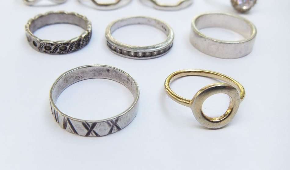 OH BOY !! WHAT A TREAT !! NINE SOLID STERLING SILVER RINGS FOR YOUR COLLECTION !! BID FOR THE LOT !!