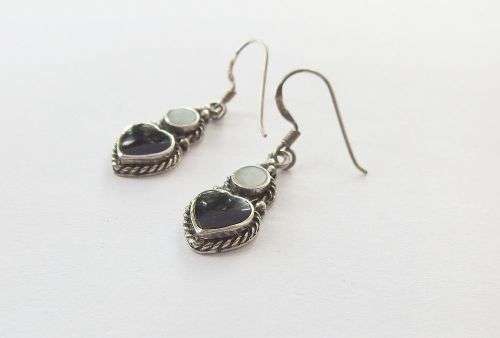 A STYLISH PAIR OF SOLID STERLING SILVER EARRINGS WITH BLACK HEART INSETS AND MOTHER OF PEARL !! WOW