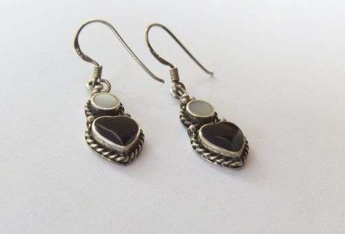A STYLISH PAIR OF SOLID STERLING SILVER EARRINGS WITH BLACK HEART INSETS AND MOTHER OF PEARL !! WOW