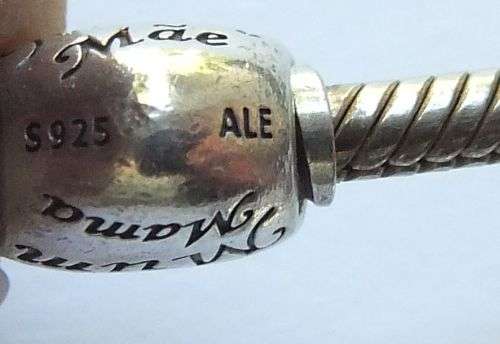 WOW ! OVER R3000 VALUE !! A GENUINE PANDORA SOLID STERLING SILVER CHARM BRACELET WITH FIVE CHARMS !!