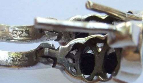 A QUALITY HIGH CLASS SOLID STERLING SILVER HINGED PAIR OF EARRINGS SET WITH DARK AND CLEAR STONES !!