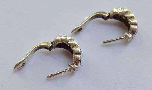 A QUALITY HIGH CLASS SOLID STERLING SILVER HINGED PAIR OF EARRINGS SET WITH DARK AND CLEAR STONES !!