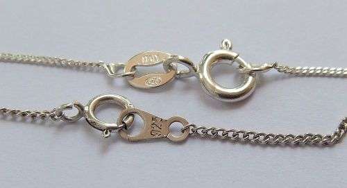 GENUINE SHELL & A WHALE TAIL !! TWO STERLING SILVER NECKLACES AND TWO STERLING SILVER PENDANTS !!