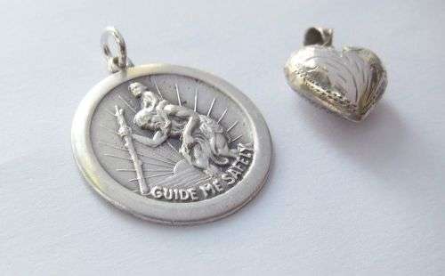 FOR HIM AND HER !! A SOLID STERLING SILVER ST CHRISTOPHER AND A HOLLOW HEART PENDANT !! TAKE BOTH !!