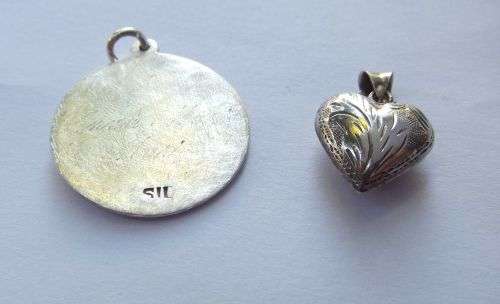 FOR HIM AND HER !! A SOLID STERLING SILVER ST CHRISTOPHER AND A HOLLOW HEART PENDANT !! TAKE BOTH !!