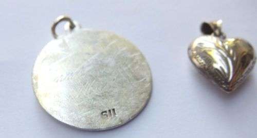 FOR HIM AND HER !! A SOLID STERLING SILVER ST CHRISTOPHER AND A HOLLOW HEART PENDANT !! TAKE BOTH !!