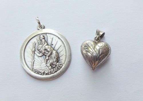 FOR HIM AND HER !! A SOLID STERLING SILVER ST CHRISTOPHER AND A HOLLOW HEART PENDANT !! TAKE BOTH !!