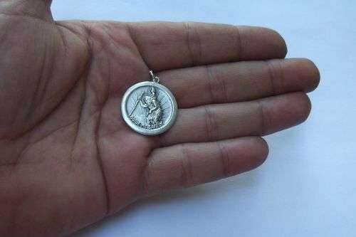 FOR HIM AND HER !! A SOLID STERLING SILVER ST CHRISTOPHER AND A HOLLOW HEART PENDANT !! TAKE BOTH !!