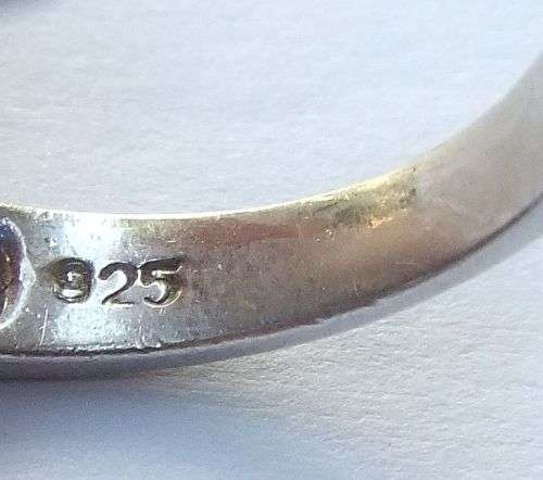 A GORGEOUS SOLID STERLING SILVER RING SET WITH A FACETED BLUE STONE AND CLEAR STONES !! MUST SEE !!