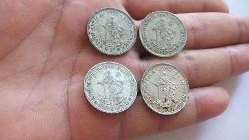 COOL FIND !! FOUR SILVER UNION OF SOUTH AFRICA SHILLING COINS !! BID FOR THE LOT !! SEE PICS !!