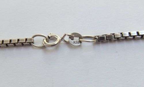 A VINTAGE STERLING SILVER SQUARE LINK NECKLACE WITH A DETAILED SOLID STERLING SILVER CROSS PENDANT