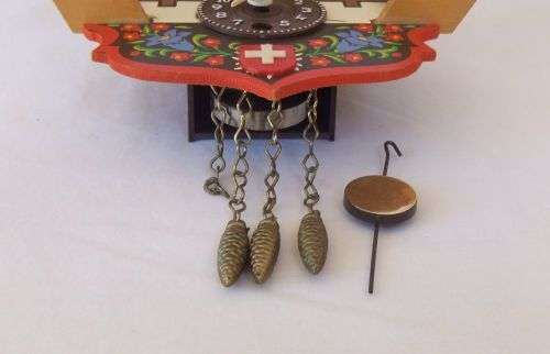 AN ADORABLE VINTAGE SWISS WALL CLOCK WITH LOADS OF CUTE DETAIL !! NO KEY TO TEST ... NEEDS TLC ??