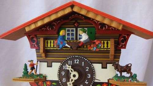 AN ADORABLE VINTAGE SWISS WALL CLOCK WITH LOADS OF CUTE DETAIL !! NO KEY TO TEST ... NEEDS TLC ??