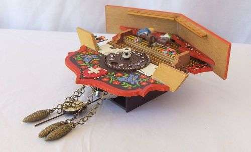 AN ADORABLE VINTAGE SWISS WALL CLOCK WITH LOADS OF CUTE DETAIL !! NO KEY TO TEST ... NEEDS TLC ??