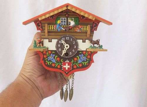 AN ADORABLE VINTAGE SWISS WALL CLOCK WITH LOADS OF CUTE DETAIL !! NO KEY TO TEST ... NEEDS TLC ??