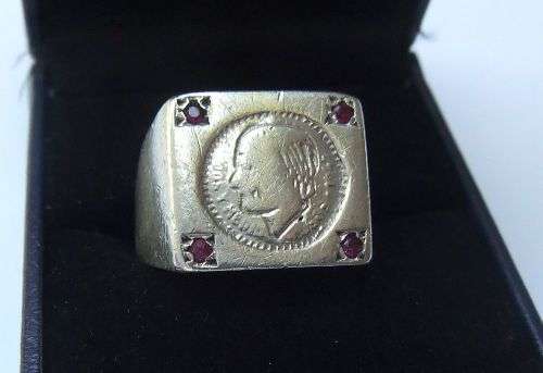 A COOL VINTAGE SOLID STERLING SILVER RING WITH `COIN` FEATURE AND FOUR FACETED RED STONES !! WOW !!