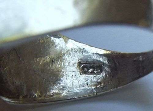 A COOL VINTAGE SOLID STERLING SILVER RING WITH `COIN` FEATURE AND FOUR FACETED RED STONES !! WOW !!