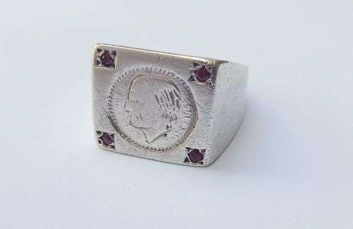 A COOL VINTAGE SOLID STERLING SILVER RING WITH `COIN` FEATURE AND FOUR FACETED RED STONES !! WOW !!