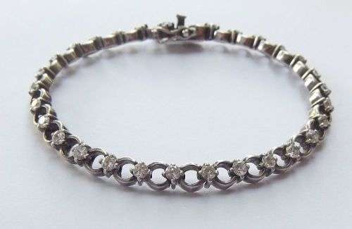 A CLASSY VINTAGE LOOK SOLID STERLING SILVER BRACELET WITH SAFETY CLASP AND FACETED STONES !! LOOK !!