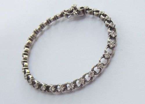 A CLASSY VINTAGE LOOK SOLID STERLING SILVER BRACELET WITH SAFETY CLASP AND FACETED STONES !! LOOK !!