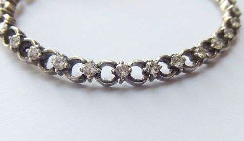 A CLASSY VINTAGE LOOK SOLID STERLING SILVER BRACELET WITH SAFETY CLASP AND FACETED STONES !! LOOK !!