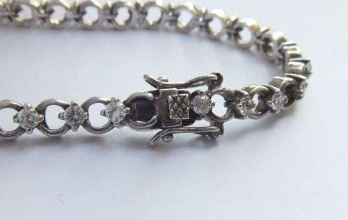 A CLASSY VINTAGE LOOK SOLID STERLING SILVER BRACELET WITH SAFETY CLASP AND FACETED STONES !! LOOK !!