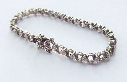 A CLASSY VINTAGE LOOK SOLID STERLING SILVER BRACELET WITH SAFETY CLASP AND FACETED STONES !! LOOK !!
