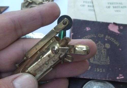 A COOL JOBLOT OF COLLECTABLES !! AFRICANA !! MILITARIA !! LIGHTERS !! MEDALLIONS !! BID FOR THE LOT