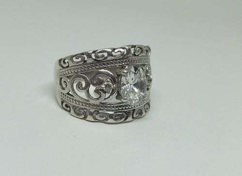 A SUPERB SOLID STERLING SILVER RING WITH UNIQUE DESIGN SET WITH FACETED CZ STONES !! FULLY TESTED !!