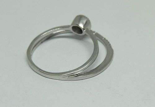 UNUSUAL BUT NOT CRUEL !! A UNIQUE SOLID STERLING SILVER DOUBLE RING SET WITH FACETED STONES !!