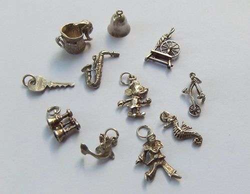 PERFECT MIXTURE !! A JOBLOT OF 11 VINTAGE SOLID STERLING SILVER CHARMS !! MECHANICAL CAT IN BIN !!