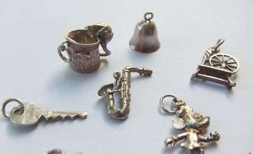 PERFECT MIXTURE !! A JOBLOT OF 11 VINTAGE SOLID STERLING SILVER CHARMS !! MECHANICAL CAT IN BIN !!