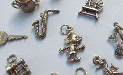 PERFECT MIXTURE !! A JOBLOT OF 11 VINTAGE SOLID STERLING SILVER CHARMS !! MECHANICAL CAT IN BIN !!