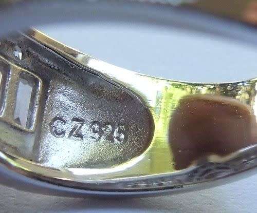 AN EXQUISITE STERLING SILVER DESIGER RING SET WITH FACETED STONES OF VARIOUS CUTS ! SUPERB CONDITION