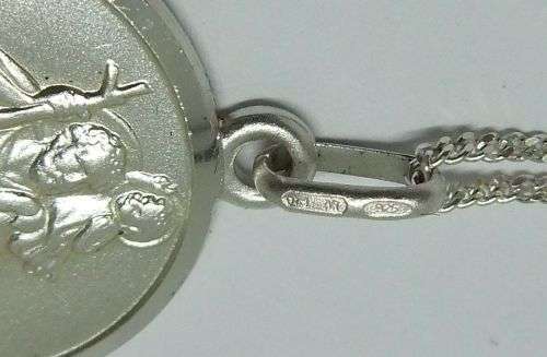 A BEAUTIFULLY DETAILED STERLING SILVER ST CHRISTOPHER PENDANT PLUS A STERLING SILVER NECKLACE !! WOW