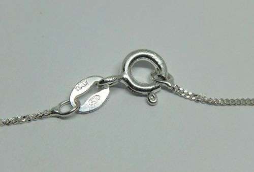 R1 START !! A Sterling Silver necklace with Sterling Silver pendant set with a faceted red stone !!