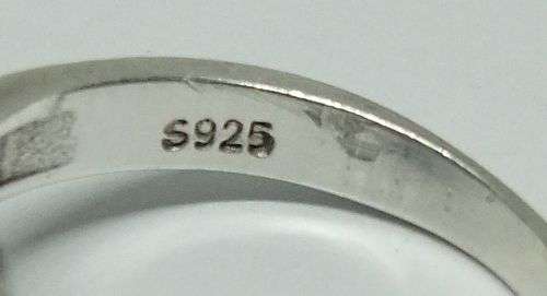 R1 START !! A solid Sterling Silver ring set with a white cabochon stone and faceted stones !! LOOK