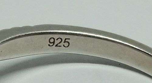 R1 START !! An elegant solid Sterling Silver ring set with faceted clear CZ stones !! FREE COMBINING