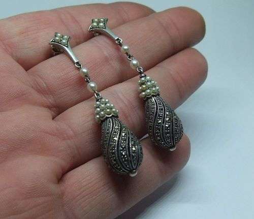 AN EXQUISITE VINTAGE LOOK PAIR OF HEAVY STERLING SILVER EARRINGS WITH MARCASITE AND SEED PEARLS !!