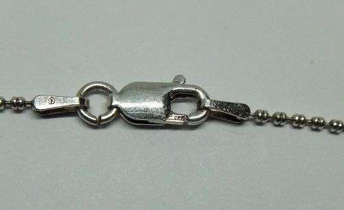 AN ELEGANT GENUINE STERLING SILVER NECKLACE WITH TASSLE CENTERPIECE AND STRONG CLASP !! WOW !!