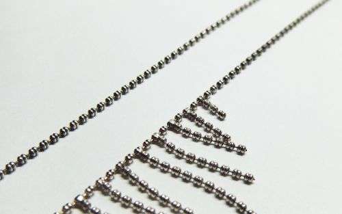 AN ELEGANT GENUINE STERLING SILVER NECKLACE WITH TASSLE CENTERPIECE AND STRONG CLASP !! WOW !!