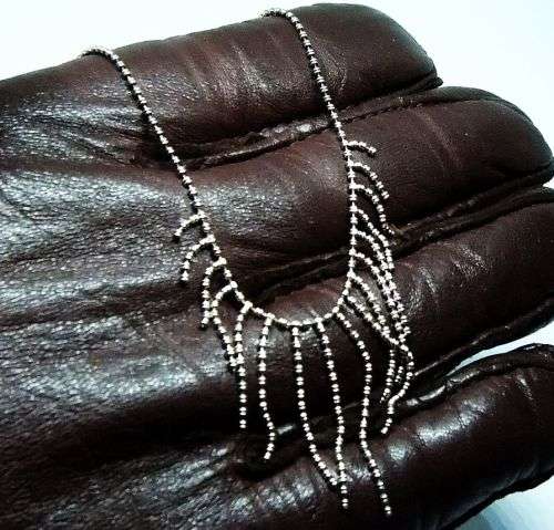 AN ELEGANT GENUINE STERLING SILVER NECKLACE WITH TASSLE CENTERPIECE AND STRONG CLASP !! WOW !!