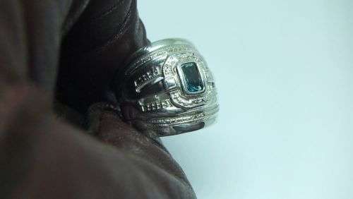 AN EXCEPTIONAL WIDE SOLID STERLING SILVER RING SET WITH A FACETED BLUE STONE IN GREAT CONDITION !!