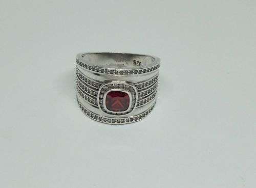 AN AMAZING WIDE SOLID STERLING SILVER RING SET WITH LOTS OF FACETED STONES !! MUST SEE , MUST HAVE !