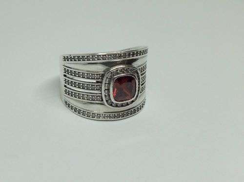 AN AMAZING WIDE SOLID STERLING SILVER RING SET WITH LOTS OF FACETED STONES !! MUST SEE , MUST HAVE !
