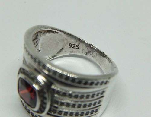 AN AMAZING WIDE SOLID STERLING SILVER RING SET WITH LOTS OF FACETED STONES !! MUST SEE , MUST HAVE !