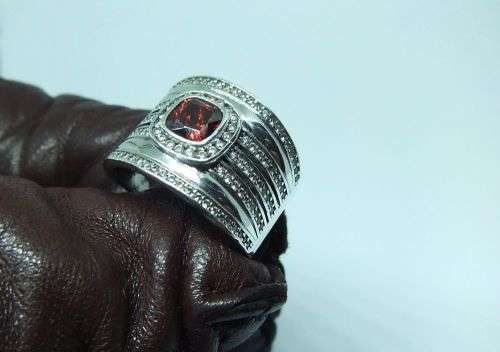 AN AMAZING WIDE SOLID STERLING SILVER RING SET WITH LOTS OF FACETED STONES !! MUST SEE , MUST HAVE !