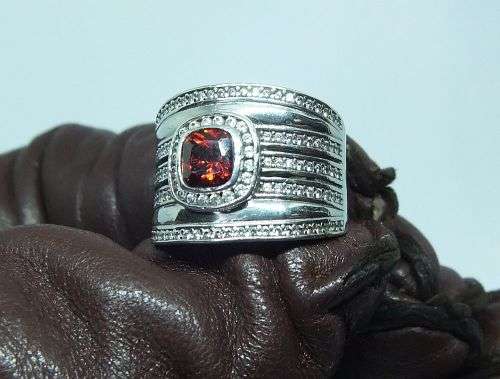 AN AMAZING WIDE SOLID STERLING SILVER RING SET WITH LOTS OF FACETED STONES !! MUST SEE , MUST HAVE !