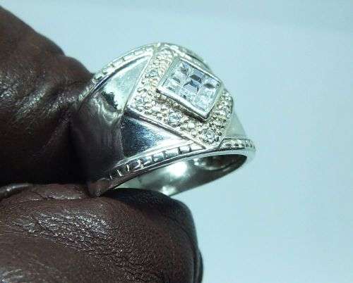 WOW !! AN AWESOME QUALITY SOLID STERLING SILVER RING SET WITH FACETED CZ STONES !! FREE COMBINING !!